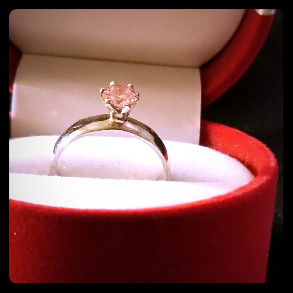 Silver solitaire ring